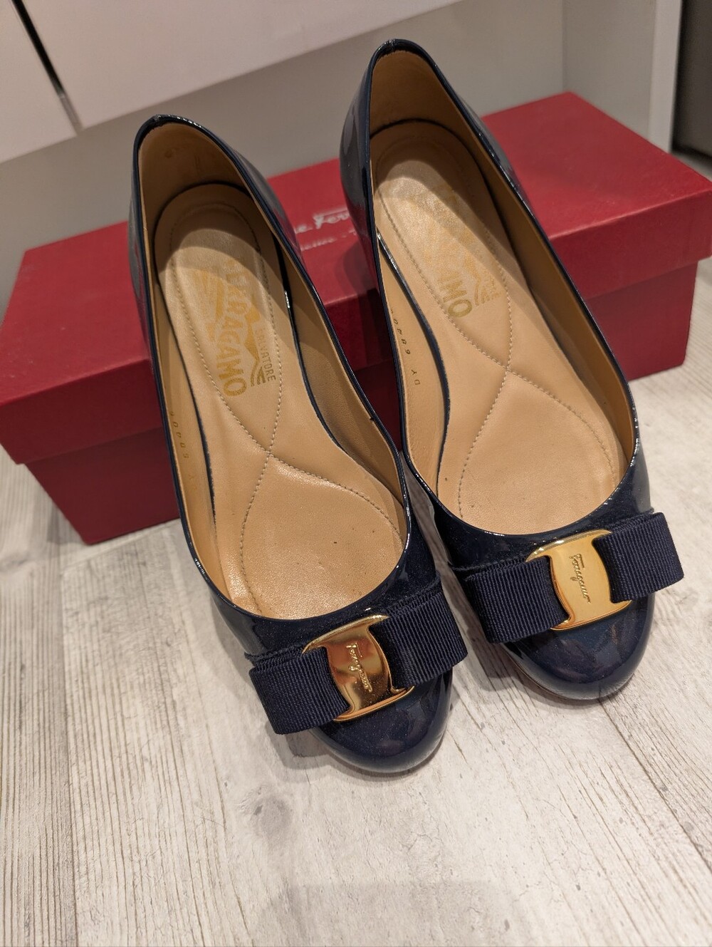 Salvatore Ferragamo Navy Patent Vara Bow Flats with Gold Hardware